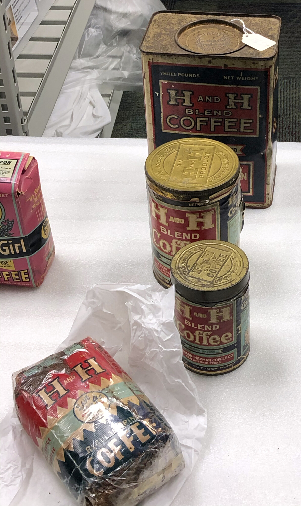 H and H Blend tins and wrapped brick, Witte, 15 October 2019