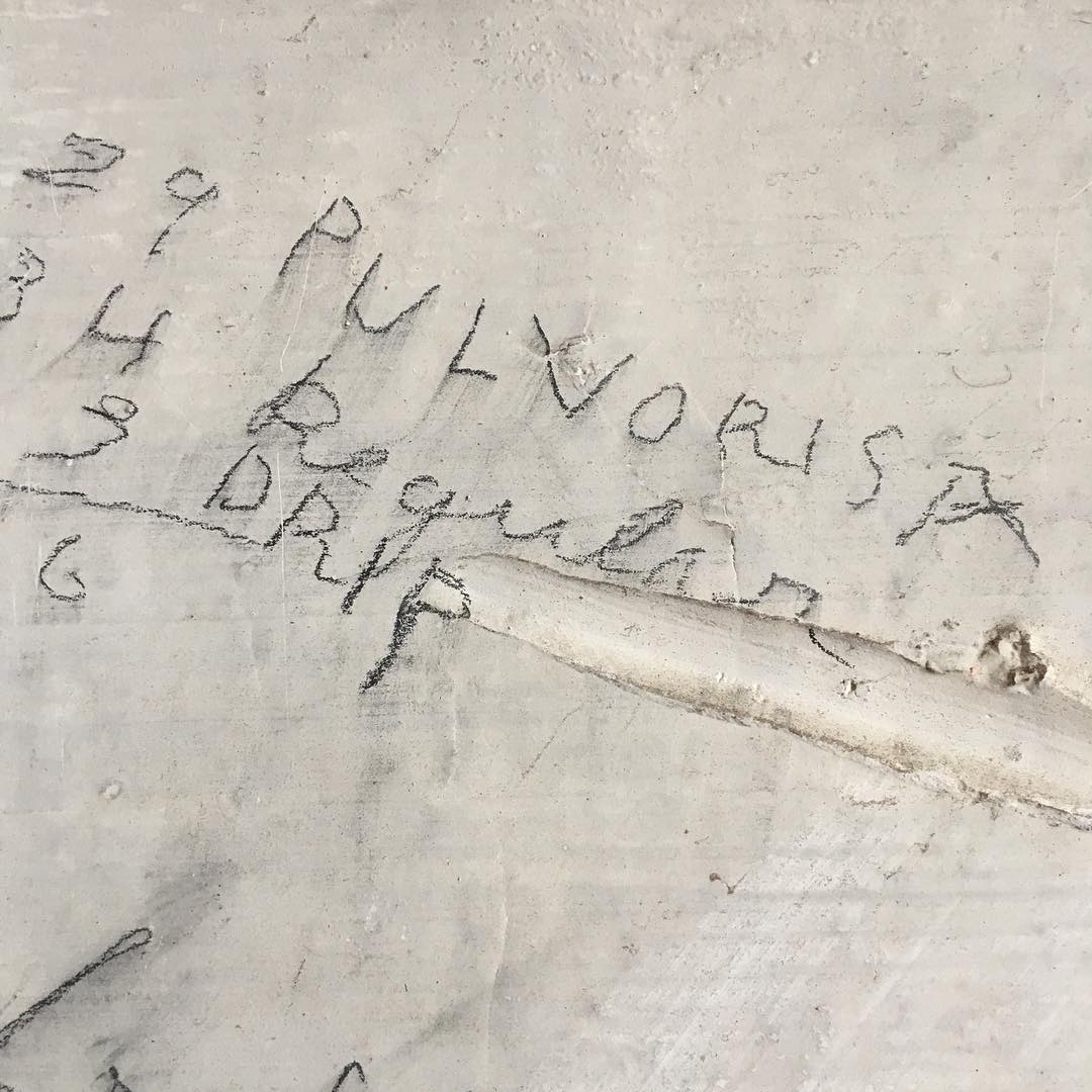 1940s inventory marks on wall