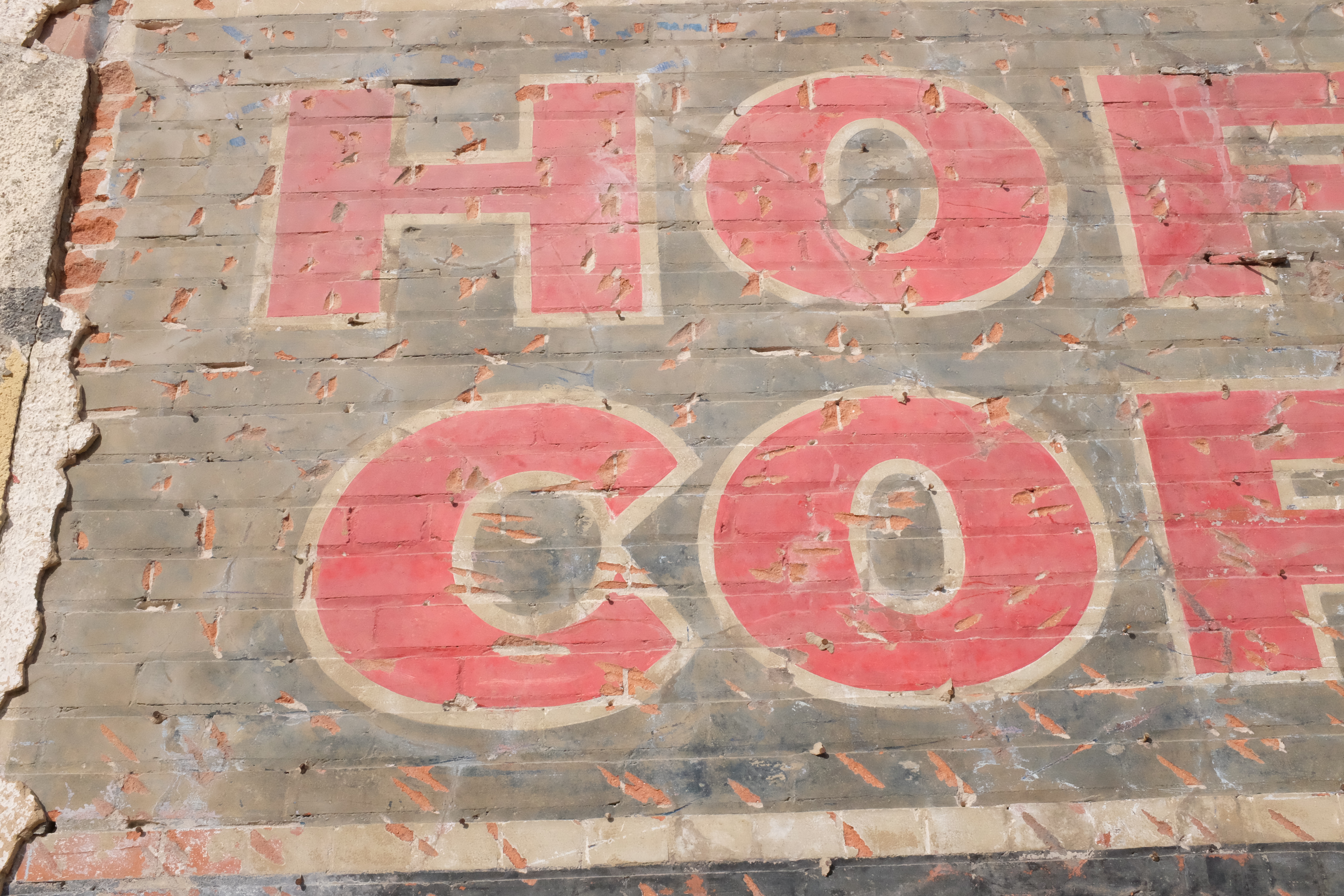 HOF / COF fragment — dark panel behind red letters