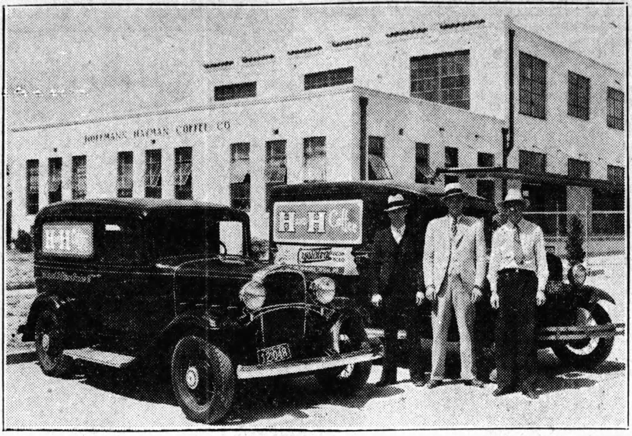 Hoffmann-Hayman delivery trucks parked in front of the Delaware Street factory with three salesmen, Express-News, 27 Mar 1933