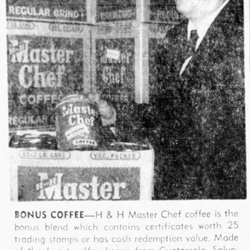 San Antonio Express-News, 25 October 1961, page 6 — photo and 'BONUS COFFEE' caption: Albert G. Menger, president of Hoffmann-Hayman Coffee Co., posing beside a stacked display of 12-2 lb case boxes of Master Chef Coffee (vacuum-packed regular grind) with a single 2lb can held in front; caption announces H & H Master Chef will be featured at the San Antonio Trade Fair, Nov 2–5, at Villita Assembly Hall