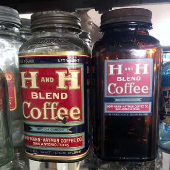 One-pound H and H Blend Coffee Crystalvac jars in clear and amber glass with full paper labels, Hoffmann-Hayman Coffee Co. San Antonio — from the Mac Johanson collection