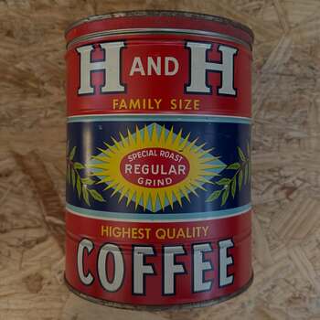 H and H Family Size keywind tin with matching top