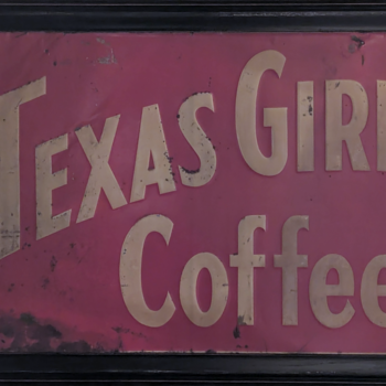 Texas Girl Coffee framed tin sign — cream block letters on a magenta field, photo courtesy Darin Grimsley